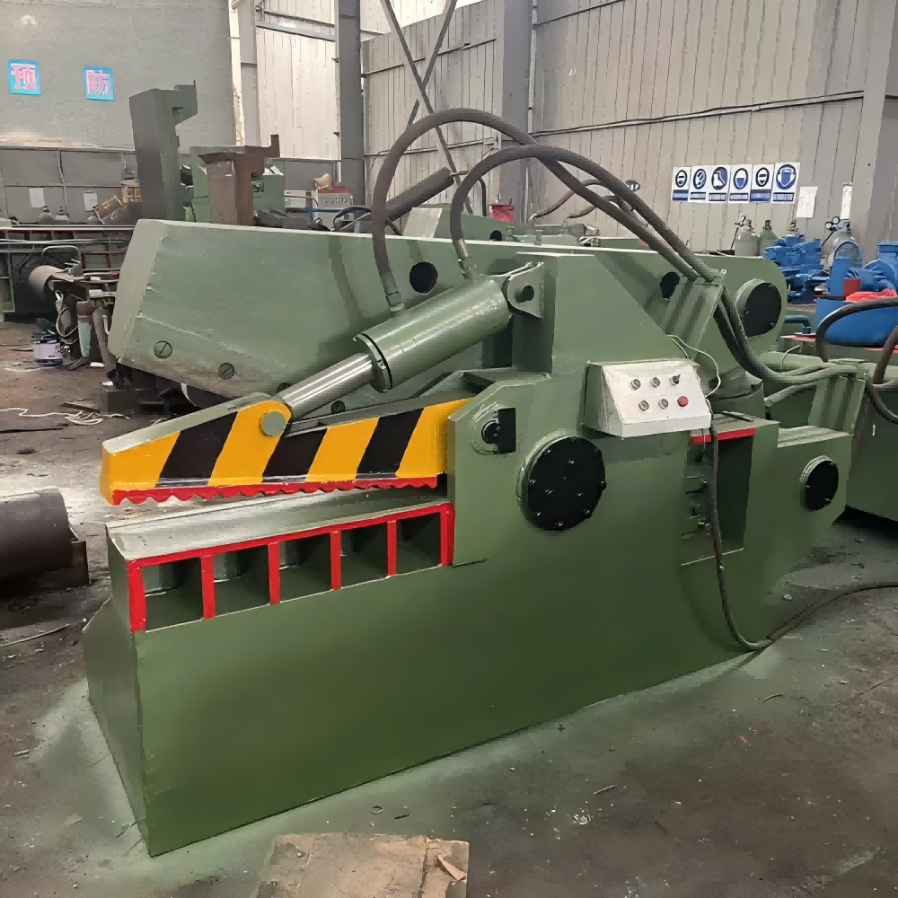Industrial scrap metal shear cutting thick steel beam with hydraulic blades
